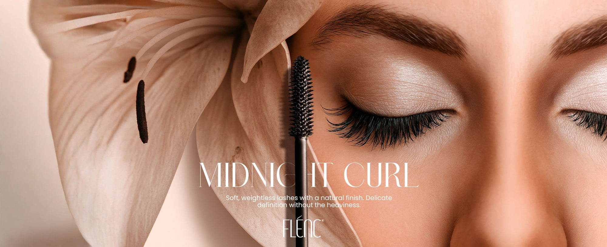 Mascara brush with eyelashes and flower, featuring Fléné brand text.